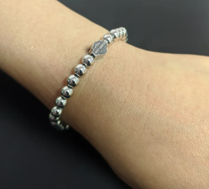 Brazalete de barra y escudo grande con cuentas para mujer